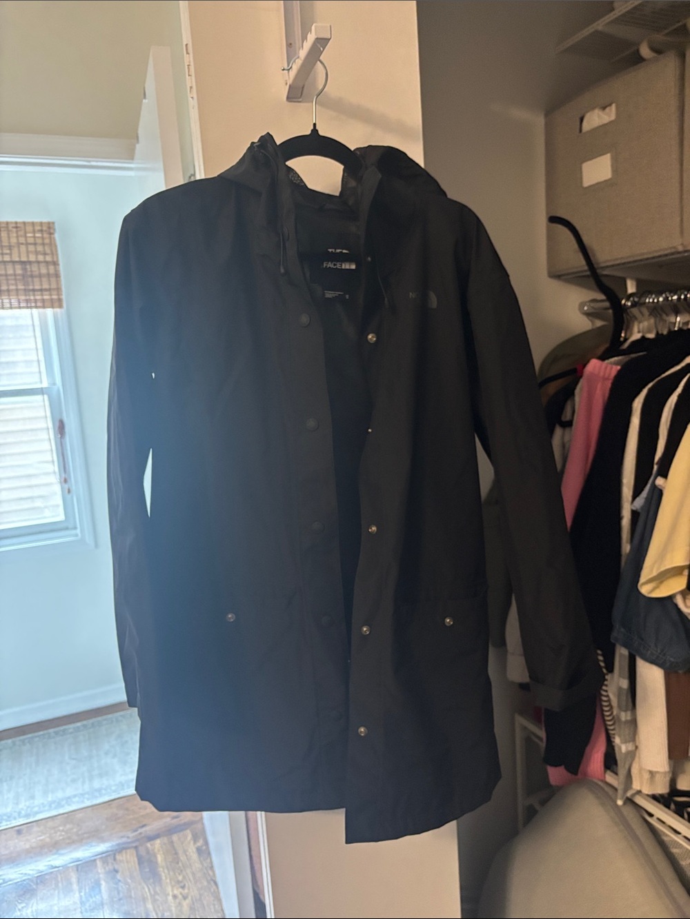 The North Face Black Hooded Midi length raincoat for women- size XS.